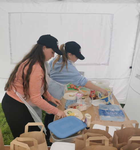 Two girls prepping food